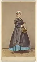 Carlo Ponti (1862–65) Flower Seller, hand-coloured albumen print