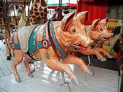 Handmade carousel pigs from the 19th century
