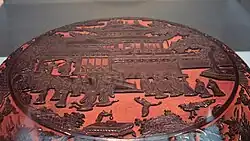 The palace of Chang'e, goddess of the moon, in black over red, 1490s