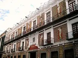 The Baroque Casa de los Muñecos in the Historic Centre of Puebla, with a facade incorporating a Talavera mosaic