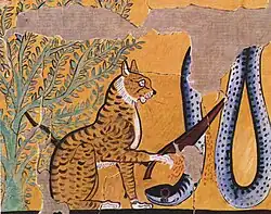 Cat decapitating a snake with a knife