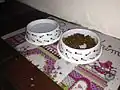 Pet bowls, which are designed to be used by domestic animals such as dogs or cats