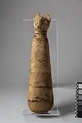 Skittle-type cat mummy with a naturalistic, modeled head.[19]