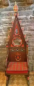 19th century cathedra (bishop's chair) in sanctuary showing arms of the Diocese of Pennsylvania