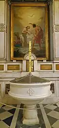 Baptistery with its marble baptismal font