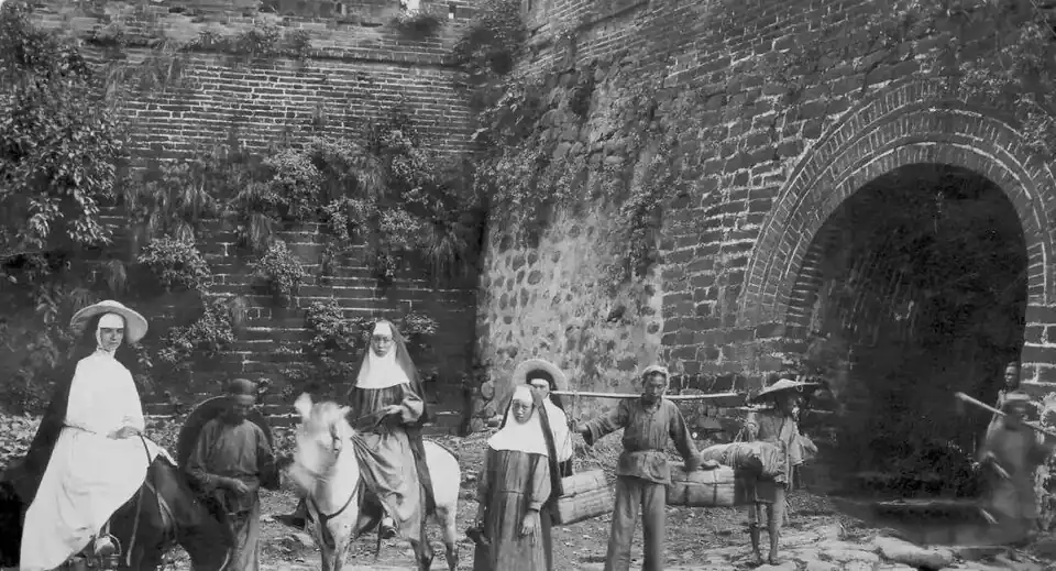 Catholic nuns, possibly French, at the South Gate of Kienchang, before 1949.