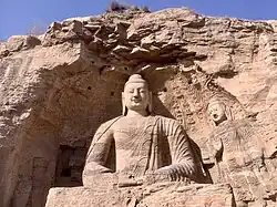 Colossal seated Buddha, Cave 20, Yungang Grottoes, Shanxi. Northern Wei dynasty (5th century).