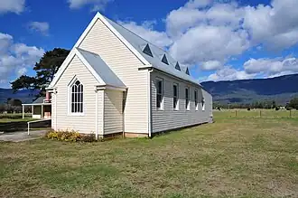 The "church in the paddock", Caveside's Church of Christ.