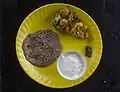 Buckwheat bread (roti) with potato veg and sour curd, Sikkim, India