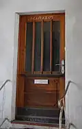 Epiphany season door chalking on an apartment door in Germany