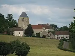 The church and surrounding buildings in Challement