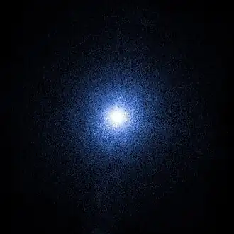Black hole Cygnus X-1 as seen by the Chandra X-Ray Observatory, a bright spot over a black background.