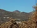 Panoramic view of the Saint Mary Magdelene Church (The conical hill is in Champtercier.)