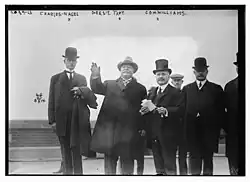 Williams (right) with President William Howard Taft (middle) and Secretary of Commerce Charles Nagel (left) on Ellis Island in 1910.
