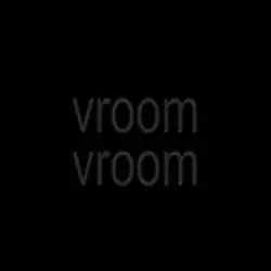 The words "vroom vroom" written in dark grey lowercase, low-resolution Arial Narrow font on a black background.