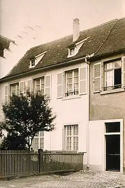Sepia photograph of a townhouse.