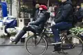 Chauffeur-driven bicycle, on Damstraat in Amsterdam