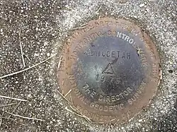 Horizontal control marker placed by the National Geodetic Survey in 1975 at the site of the tower