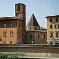 Exterior view from the opposing south bank of the Arno river