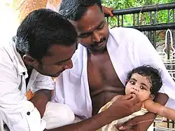 Image 12Annaprashanam is the rite of passage where the baby is fed solid food for the first time. The ritual has regional names, such as Choroonu in Kerala. (from Samskara (rite of passage))