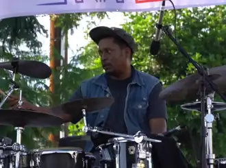Dave performing in 2019