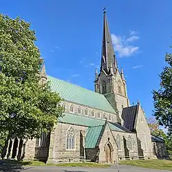 A color photograph of a Gothic Revival Anglican church
