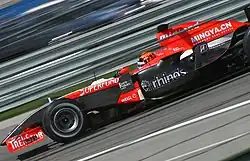 Albers driving the M16 at Indianapolis