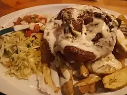 Image 12Pork chop with plantain chips (from Honduran cuisine)