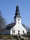 Köping church. There are over half a dozen church buildings within Köping's city limits, including two Catholic churches, but this church is the largest and most prominent, being located right next to the town square, and is usually referred to locally simply as "Kyrkan" ("The Church") or "Stora Kyrkan" ("The Big Church")