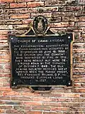 Historical marker installed at the current church building