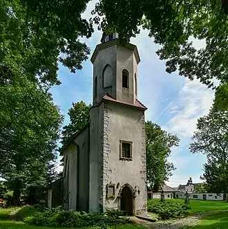 Front view, bell tower and porch