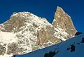 East aspect of Cima di Ball (left) and Campanile Pradidali (right) rise above Rifugio Pradidali