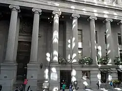Columns on the bottom half of the building