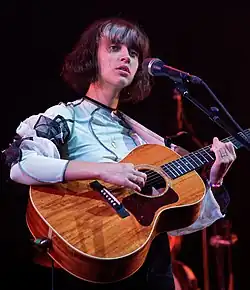 Pomme, performing in 2021