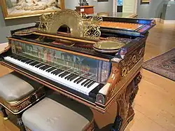 1884 Steinway grand piano designed by Sir Lawrence Alma-Tadema with painted panel by Sir Edward Poynter[c]