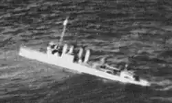 USS Pope capsizing to starboard