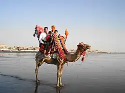 Camel rides along Clifton Beach are a popular activity.