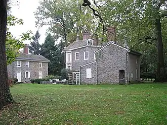 Rear of the house with outbuildings