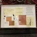 Close up of the display board of the display with documents about the fire