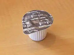 Individual plastic container of coffee creamer, Japan