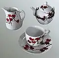 Coffee pot and cups in red maple leaves design was used at the time of opening