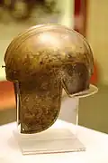 Illyrian helmet from Timis, Romania with horseman and six rose-petal decorations (6th–4th century BC).