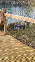 Cold water safety sign, M lake (March 2025)
