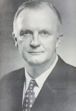 A black and white photograph of a man