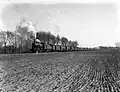 A steam locomotive from the series 3400 of the N.S. with an oil train near Dalfsen. (1951)