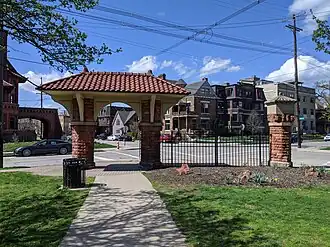William H. Fish Gate, with the Fish House directly behind it and the Circus House arched driveway to the left