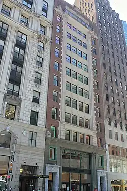 The facade of 1780 Broadway, a New York City designated landmark preserved at Central Park Tower's base, is made of limestone and brick.