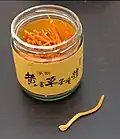 A jar of dry C.&nbsp;militaris fruiting body