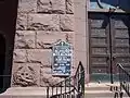 sign to the left of the front entrance