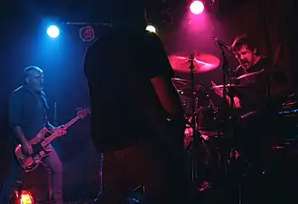 Cosmic Psychos, left to right: Ross Knight, John McKeering, Dean Muller Performing in June 2007.